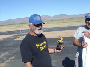 Jim Simo takes home the trophy for Best Warbird Landing.