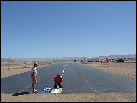Yeah! ... MT Bob and David Duke complete the stripe down the middle of the runway... !