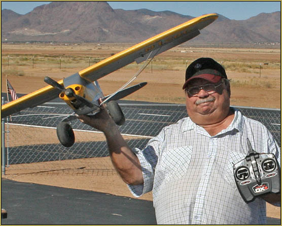 Rick Atkeson holds his Carbon Cub on the day of his solo flight!