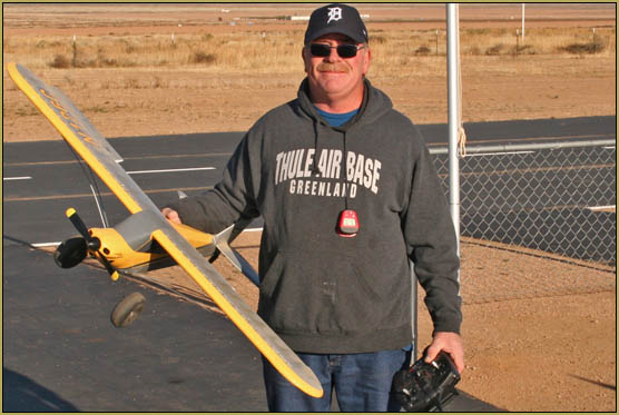 Rich Caringi poses with his Carbon Cub after making his solo flight!